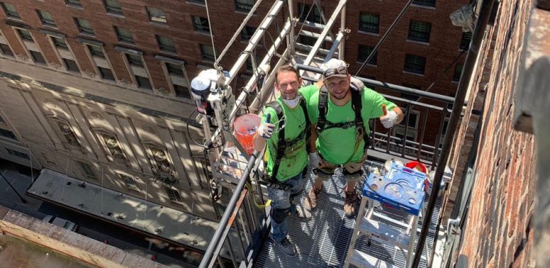 high-rise building balconies painting chicago