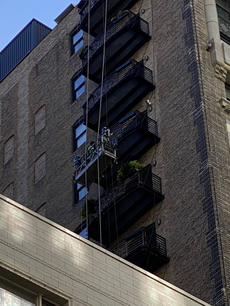 high rise building balconies painting chicago
