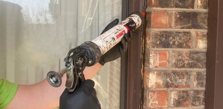 Should you caulk the exterior before or after painting?